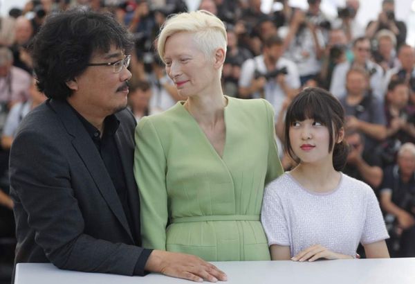 Bong Joon-Ho, Tilda Swinton and An Seo Hyun at the Cannes Film Festival for the premiere of Okja